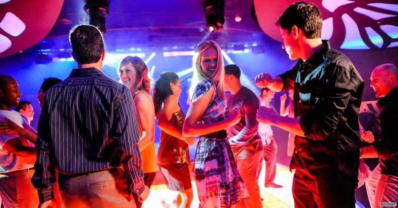 People dancing at the Evolution Night Club on a Disney Cruise Ship