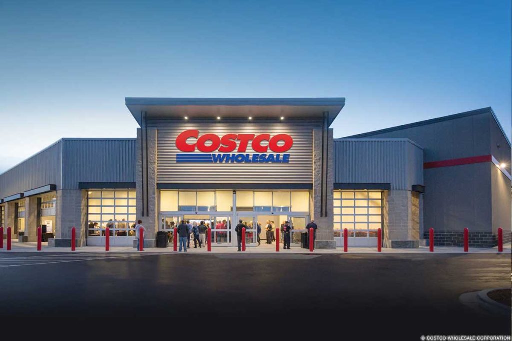 Exterior image of a Costco Wholesale store at dusk