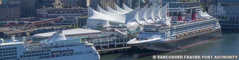 A Disney Cruise Ship and another cruise ship docked a Canada Place in Vancouver, Canada