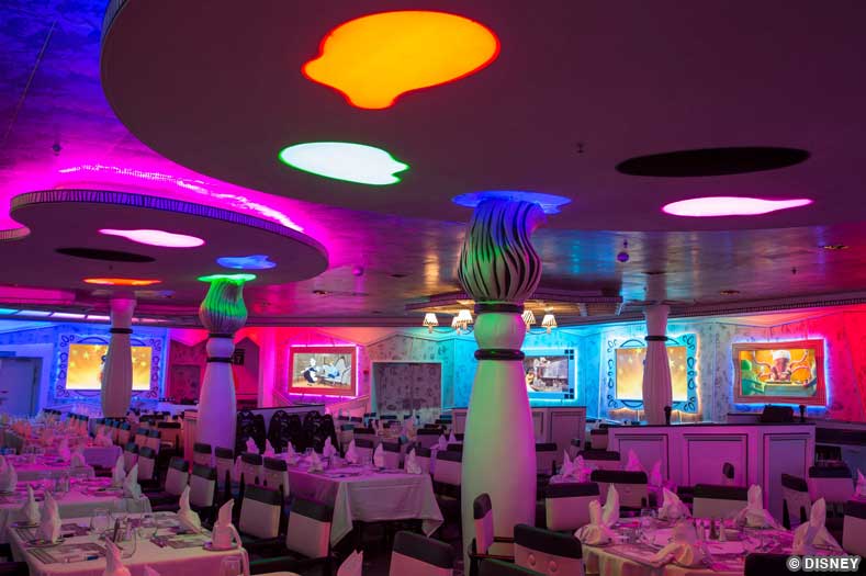 The dining room of Animator's Palate, with oversized art brushes and colorful light fixtures resembling an artist's paint palate.