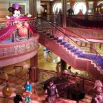 Disney Cruises with Specialty Themes: Mickey Mouse, from a balcony, greets Guests during a Halloween on the High Seas specialty cruise