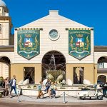 Guests walking in front of Portofino Bay hotel, one of the hotels in walking distance of Universal Orlando Resort theme parks