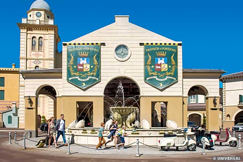 Guests walking in front of Portofino Bay hotel, one of the hotels in walking distance of Universal Orlando Resort theme parks