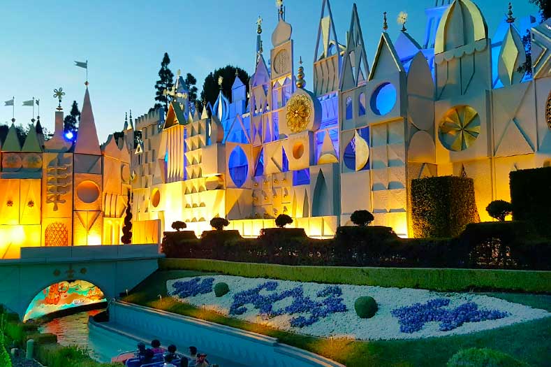 Best time to visit Disneyland: A boat sails into the entrance of "it's a small world" at Disneyland on early evening in February