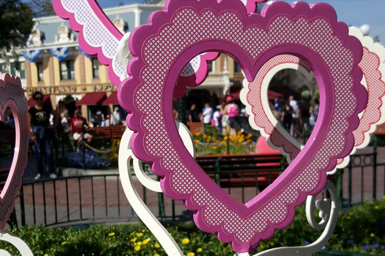 Large Pink Heart Decorations in the square, with Emporium in the background
