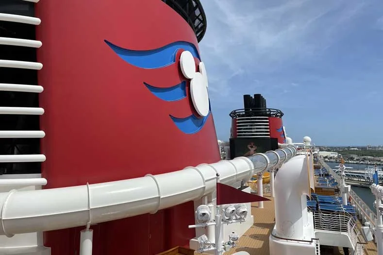 The iconic red funnels of a Disney Cruise Ship