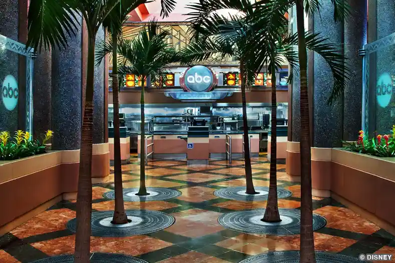 The palm-lined entrance of the ABC Commissary