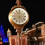 Closing Times for Disney World Parks: A large street clock shows 1AM on Main Street USA at Magic Kingdom theme park