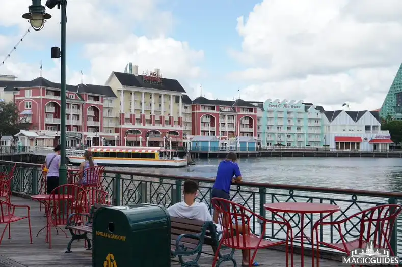 Exterior of Disney's BoardWalk Inn, with boats on the water nearby