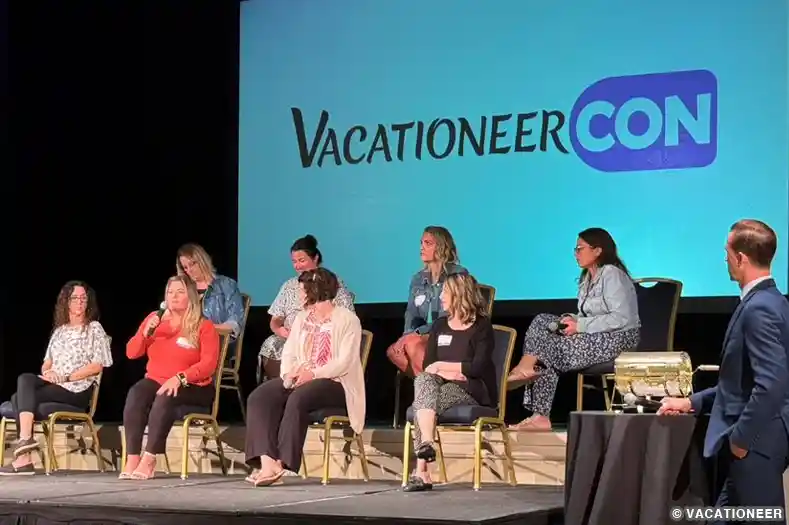 A group of Disney travel planners at a panel discussion during an onsite convention
