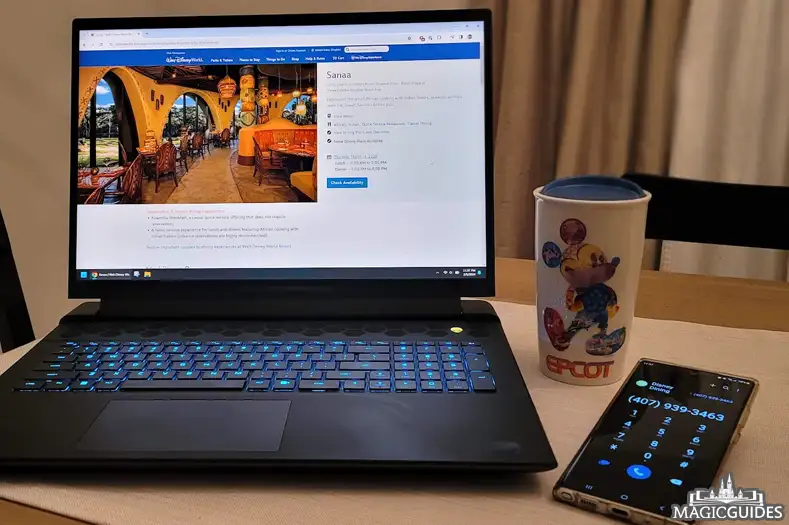A laptop computer and phone, the only required equipment to become a Disney Travel Agent