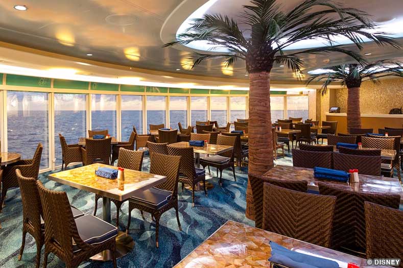 Tables in a buffet restaurants, with columns shaped like palm trees