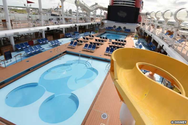 Mickey-shaped pool and bright yellow waterslide