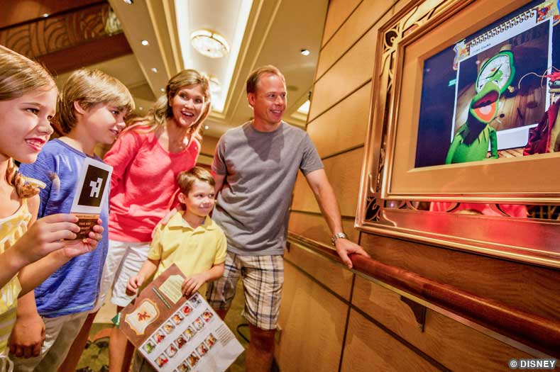 A family displays their detective badge to an interactive piece of artwork as part of the game