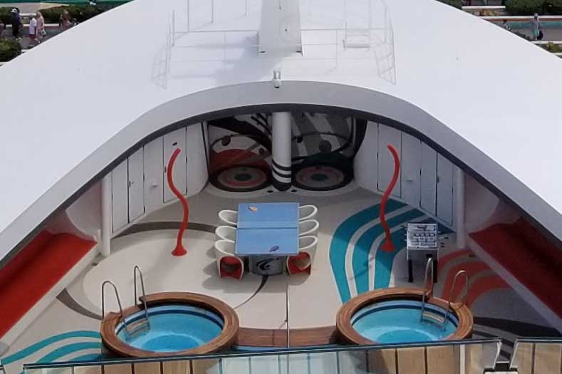The outdoor sundeck of Vibe, with small pools and game tables