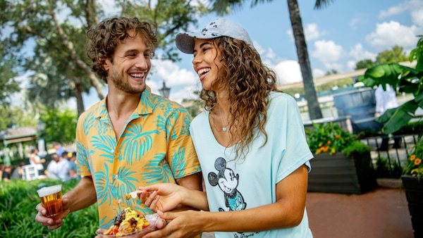 Couple enjoying the Epcot Food and Wine Festival