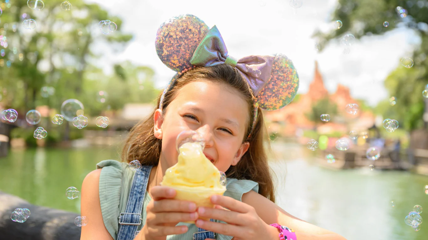 girl enjoying ice cream at disney world